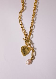 Bleecker St Luxury Gold Necklace With Pearl Charm, Luxury Classic Charm Necklace, Popular Jewelry 2022, Trending Accessories 2022, Trendy Necklaces 2022, Trendy Accessories Jewelry 2022, Gold Pearl Necklace With Heart Charm And Pendant, Gold Dangle Charm Necklace With Pearl Drop, Gold Dangle Heart Necklace With Charm