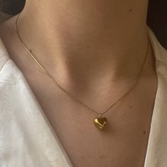 Puffed Mini Heart Necklace in Gold ✨ Fully stainless steel & tarnish proof! (18k gold plated) 16" with a 2" extender  Snake chain style featuring a mini gold puffed heart pendant 🤍 The heart measures 1cm x 1cm Handmade with love! Gold Heart Necklace With Box Chain, Gold Heart Shaped Box Chain Jewelry, Gold Heart Pendant Necklace With Box Chain, Heart Shaped Gold Chain Necklace For Gift, Heart-shaped Gold Chain Necklace For Gift, Yellow Gold Heart Necklace With Gold Chain, Gold Plated Heart Necklace With Gold Chain For Gift, Gold Heart Necklace As Gift, Puffed Heart Necklace