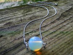 Will O' the Wisp minimalist necklace, opalite necklace, dainty necklace, layering jewelry, minimalist jewelry, fantasy jewelry, gemstone by PixieShards on Etsy https://www.etsy.com/listing/199780460/will-o-the-wisp-minimalist-necklace Will O The Wisp, Opalite Necklace, Layering Jewelry, Diamond Shape Earrings, Jewelry Minimalist, Necklace Layering, Tourmaline Necklace, Layered Jewelry, Jewelry Gemstone