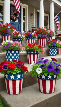 patriotic flower pots with flowers in them on the steps