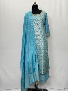 Blue Zari / Brocade Straight Sleeveless Silk Kurta With Trousers and Dupatta Indian Summer Wear Salwar Kameez / Indian Ethnic Dress / Plus Size Cotton Kurta Dress Traditional Indian Wear / Salwar Kameez Dupatta / Kurti Palazzo Set The set contains: 1 Kurta 1 Palazzos 1 Dupatta Kurta: The Blue straight Kurta has a round neck design with brocade / Zari woven design. The Kurta measures till calf length and has straight hemline. it comes with two pockets.  Sleeve length :  3/4 Sleeves Palazzos: Solid trousers  has elasticated waistband and slip on closure.  Dupatta : Printed Dupatta.  Material : Kurta : Silk Blend Palazzos :  Silk Blend Dupatta : Silk Blend Fabric Care : Hand wash Please see the size information below to choose a perfect size for yourself:  (size in inches)  XS : BUST 34 | WAI Traditional Blue Palazzo Set For Festive Season, Traditional Blue Palazzo Set For Festive Occasions, Blue Art Silk Palazzo Set For Eid, Embroidered Blue Palazzo Set For Transitional Season, Blue Unstitched Palazzo Set For Transitional Season, Festive Blue Palazzo Set With Zari Work, Blue Resham Embroidery Palazzo Set For Summer, Blue Bollywood Art Silk Palazzo Set, Blue Palazzo Set With Dupatta For Summer