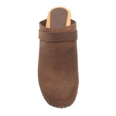 "The Tia is a hand-made fashionable wooden clog, featured in soft oiled full grain leathers. * Hand-made in Europe * Oiled Leather * 2.75\" / 70mm heel and .75\" / 20mm platform * Genuine European wooden outsole with rocker bottom to propel your foot forward * Wood outsole harvested from sustainable European forests ---> Ships in 1 business day from the US ---> Sizing Conversion EU US Women's EU 35 ---- US 5 EU 36 ---- US 5.5 - 6 EU 37 ---- US 6.5 EU 38 ---- US 7 - 7.5 EU 39 ---- US 8 - 8. Leather Clogs With Plain Toe, Natural Leather Sole Slip-on Clogs, Natural Color Slip-on Clogs With Leather Sole, Classic Brown Mules With Leather Footbed, Rugged Mules With Rubber Sole And Round Toe, Classic Brown Mules With Rubber Sole, Brown Wooden Clogs With Wooden Heel, Classic Brown Clogs With Leather Footbed, Brown Wooden Heel Clogs