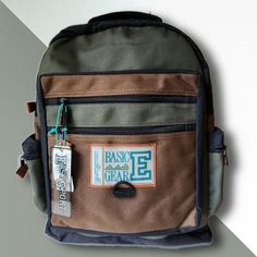 Boy's Eastsport, Outdoor Themed Forest Green & Brown Color, Basic Gear Backpack Light Weight And Durable, Ideal For Back To School And Outdoor Activities Large Main Compartment With Zipper Closure Logo Accented Front Two Large Zippered Front Compartments And Two Large Zippered Side Pockets Adjustable Padded Shoulder Straps Approx. Mea. H 16" X W (14"With Pockets, 9" Top, 12" Bottom) X D 5" Made In Hong Kong Please Feel Free To Contact Me If You Have Any Questions Or Need Clarification. Thanks Fo Casual Softback Backpack For Outdoor Activities, Casual Green Backpack For Outdoor, Rectangular Casual Backpack For Hiking, Casual Sports Backpack For Back To School, Casual Hiking Backpack, Green Casual Backpack For Outdoor Activities, Casual Green Backpack For Outdoor Activities, Rectangular Backpack For Back To School Outdoor Activities, Casual Backpack For End Of School Year