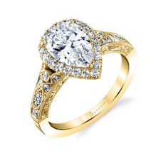 a rose gold engagement ring with an oval cut diamond center and pave set shoulders