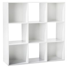 a white bookcase with six sections on one side and four shelves on the other