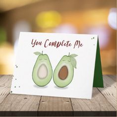 an avocado card with the words you complete me written on it and two halves cut in half