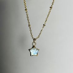 ✵Listing is for one necklace   ✵10x10 mm gold-plated Moonstone charm ✵24k gold plated satellite chain, 15-17.5 inches long and adjustable  ✵Please note: these gemstones are natural, therefore, will be unique in size, color, and texture. ✵Packaged in gold tissue paper with recyclable earring card holders, receipt included upon request  ✵Dainty, classy, & minimalistic style Get the matching set! Earring link down below:  https://www.etsy.com/listing/1368781592/moonstone-24k-gold-plated-star-celest Gold Star Jewelry For Gifts, Dainty Gold Crystal Pendant Necklaces, Delicate Star Shaped Jewelry For Gifts, Dainty Gold Plated Jewelry With Star Charm, Gold Clavicle Chain Crystal Necklace For Gift, Gold Dainty Jewelry With Star Charm, Dainty Gold Jewelry With Star Charm, Delicate Star-shaped Jewelry For Gift, Delicate Star-shaped Jewelry Gift