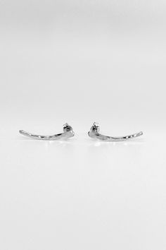 These little Ear Climbers in Sterling Silver are incredibly sleek and stylish, with a fit so comfortable you'll forget you're even wearing them! You can now choose from either SMOOTH for a slightly faceted, reflective finish or HAMMERED for a sparkling, textured finish. Each earring will come with a classic ear nut backing. Choose ONE SINGLE CLIMBER (specify which ear) or a PAIR. Each Climber measures approximately 1 inch. Also available in 14K Gold Fill or 14K Rose Gold Fill metal. Handmade to Everyday White Gold Sterling Silver Ear Climbers, Minimalist White Gold Sterling Silver Ear Climbers, Minimalist Nickel-free Ear Climbers For Everyday, Everyday Minimalist Nickel-free Ear Climbers, Minimalist Sterling Silver Nickel-free Ear Climbers, Dainty Sterling Silver Single Ear Climber, Modern Sterling Silver Cartilage Earrings For Everyday, Minimalist Sterling Silver Ear Climbers With Ear Wire, Sterling Silver Ear Climbers For Everyday