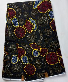 "Material: 100% cotton QUALITY FABRIC Print: DOUBLE-sided  Width: 45\" This timeless appeal & adorable African print is perfect for making African Clothing, African Quilts, Upholstery, Home Décor, and unique accessories. FABRIC CUT:        Purchase of 1+ yards per customer will be cut as 1 continuous  piece of fabric up to a maximum length of 6 yard. LABELS: All African fabric is sold with an adhesive Manufacturer label attached. Create your unique one of a kind piece. Get it today.  Each piece Fitted Black Cotton Fabric, Blue Cotton Fabric With Printed Motifs, Traditional Cotton Prints With Batik Print, Cotton Batik Print Fabric, Traditional Cotton Batik Print, Fitted Multicolor Digital Print Cotton Tops, Patterned Cotton Fabric With Batik Print, Colorful Cotton Fabric With Yellow Pattern, Patterned Batik Print Cotton Fabric