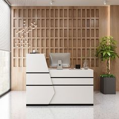 a white reception desk sitting in front of a wooden wall with planters on it