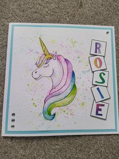 a card with an image of a unicorn on it