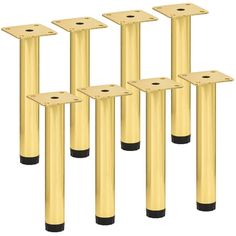 set of six gold metal poles with black bases and feet for use in outdoor furniture