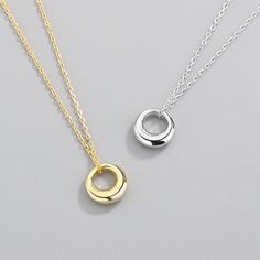 Material: Other Fashion Element: Round Style: Cold Wind Elegant Round Necklaces With Metal Ring, White Gold Round Alloy Jewelry, Round White Gold Alloy Jewelry, Everyday Alloy Clavicle Chain Jewelry, White Round Jewelry With Simple Design, Minimalist Round Alloy Jewelry, Silver Jewelry With Simple Open Circle Design, Minimalist Alloy Pendant Jewelry, White Circular Jewelry For Jewelry Making