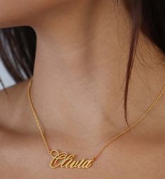 Script Font Name Plate Necklace With Rolo Chain.Designed in ItalyAvailable in 14K/18K Options Thickness: 0.8MMDimensions: 1.5" x 0.75" Custom Fonts Available Upon Request.Iced Out upon requestContact: sales@saintsgold.com Made to order. Allow 8-10 business days for production. Exquisite Gold Jewelry As Gift, Exquisite Gold Jewelry Gift, Luxury Sterling Silver Name Necklace For Formal Occasions, Luxury Sterling Silver Name Necklace For Formal Events, Formal Engraved Gold-plated Necklaces, Formal Gold Plated Engraved Necklaces, Formal Gold Plated Engraved Necklace, Gold Plated Nameplate Necklace, Gold Plated Nameplate Necklace For Wedding