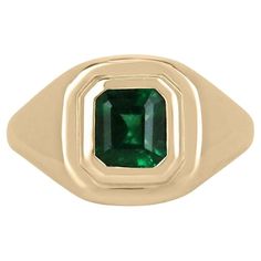 Introducing a captivating unisex emerald solitaire gold ring, featuring a striking 1.48-carat emerald of unparalleled beauty. The emerald boasts an intensely rich dark green color that commands attention, while its unique characteristics set it apart as a truly exceptional gem. Set within a luxurious 18k yellow gold bezel, this ring exudes a timeless elegance that appeals to both men and women, making it a versatile and coveted piece for anyone seeking to adorn their finger with a magnificent em Gold Solitaire Ring, Solitaire Setting, Zambian Emerald, Unique Characteristics, Asscher Cut, Yellow Gold Setting, Solitaire Ring, Green Color, Gold Ring