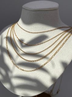 "14k Chain Necklace Cable Oval Round/Box/Twisted Singapore /Fancy Twisted Solid/Figaro Yellow Gold (16\"-22\") Introducing a luxurious addition to any jewelry collection - the 14k Gold Chain Necklace Cable Oval/Box/Twisted Singapore /Fancy Twisted Solid/Figaro Yellow Gold. Crafted from the finest real 14k gold, this exquisite chain will add a touch of elegance to any ensemble, and effortlessly transition from day to night with ease. With sizes ranging from 16\" to 22\", this timeless piece is pe Gold Oval Necklaces In Fine Jewelry Style, Gold Oval Necklace In Fine Jewelry Style, Gold Oval Fine Jewelry Necklace, Gold Oval Necklace Fine Jewelry, Dainty Oval Gold Necklace, Heirloom Oval Link Necklace For Gift, Gold Chain Necklace With Tarnish Resistant Oval Pendant, Gold Chain Necklace With Oval Pendant, Tarnish Resistant, Gold Oval Pendant Chain Necklace, Tarnish Resistant