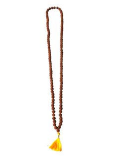 5 Mukhi(Faced) Rudraksha Beads Mala Necklace consisting of 108 plus 1 beads with yellow tassel. Rudraksha (Elaeocarpus Ganitrus) is a dried seed of a tree that grows in the Himalayan region of India, and other parts of the Eastern world. Rudraksha beads are associated with spirituality, self empowerment, and divine blessings. There are different kinds of Rudraksha beads based on the number of facets/mukhis on each bead. Note: FewwEssentials Rudraksha Beads are not consecrated. We take great care Brown Necklaces For Puja And Festivals, Festival Brown Necklace For Puja, Temple Jewelry Mala With 108 Beads For Puja, Temple Jewelry Mala With Round Beads For Meditation, Temple Jewelry Mala With 108 Beads For Rituals, Festival Necklaces With 108 Beads For Puja, Spiritual Round Beads Temple Necklace For Puja, Spiritual Temple Necklace With Round Beads For Puja, Hand-strung Brown Necklace For Puja