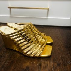 Strappy Wedge Gold Metallic Sandal-Never Worn Party Wedge Sandals With Removable Insole, Gold Wedge Heel Sandals For Spring, Gold High Heel Wedge Sandals For Spring, Casual Gold Heels For Spring, Gold Wedge Heel Sandals For Summer, Gold Wedge Sandals For Summer, Casual Gold Wedge Heel Sandals, Casual Gold Wedge Sandals, Closed Toe Gold Wedge Sandals For Vacation