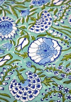 a blue and green floral print fabric