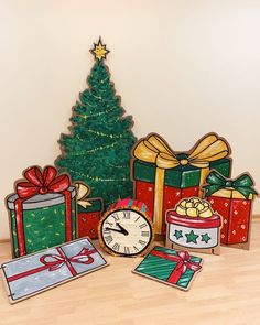 a christmas tree with presents and a clock on the floor