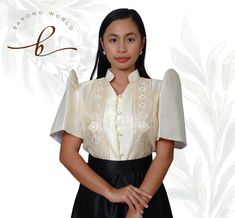 Organza Barong Tagalog Blouse for women, a sophisticated blend of tradition and modern elegance. Crafted from luxurious organza fabric, this blouse features intricate embroidery that pays homage to classic Filipino craftsmanship. The lightweight and sheer texture of the organza adds a delicate touch, while the carefully designed patterns enhance the blouse's timeless appeal. The Barong Tagalog silhouette is tailored to provide a flattering fit, with a subtle V-neckline and elegant button-down front. Perfect for formal occasions or cultural events, this blouse seamlessly combines heritage with contemporary style. Embrace tradition with a modern twist and make a statement of grace and refinement. Fitted Organza Blouse For Formal Occasions, Elegant Organza Top For Formal Occasions, Elegant Formal Organza Tops, Elegant Formal Organza Blouse, Traditional Blouse With Intricate Embroidery For Formal Occasions, Traditional Blouse With Embroidered Sleeves, Traditional Formal Blouse With Intricate Embroidery, Traditional Organza Blouse With Floral Embroidery, Formal Blouse Piece With Floral Embroidery