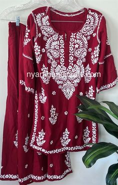 Soft, flowy Chikankari Short Top and Palazzo on modal cotton. Hand embroidered. Top length: 33 inches Palazzo length: 37 inches Embroidery designs may slightly vary. Maroon Chikankari Kurta, Kurta And Palazzo, Chikankari Kurti, Short Kurta, Short Kurti, White Kurta, Embroidered Top, Short Tops, Womens Clothing Tops