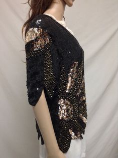 Beaded top,sequin top, 80's Beaded top, Medium, Black, Gold, Xoanon Glamorous Sequin Tops For Winter, Glamorous Winter Sequin Tops, Stretch Beaded Top For Party, Sequin Stretch Tops For Holidays, Stretch Sequin Blouse For Party Season, Holiday Sequined Stretch Tops, Holiday Sequin Stretch Top, Sequined Tops For Evening Winter Events, Glamorous Embellished Top For Winter