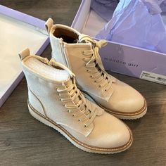 Never Worn. Comes With Original Box. Women’s Size 7 Trendy Beige Martin Boots With Round Toe, Trendy Spring Martin Boots, Trendy Beige Lace-up Martin Boots, Trendy Beige Martin Boots, Trendy Flat Boots For Spring, Trendy Spring Martin Boots Medium Width, Trendy Martin Boots With Flat Heel And Medium Width, Trendy Martin Boots With Flat Heel, Trendy Beige Martin Boots For Spring