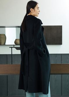 Introducing our luxurious double-face wool coat for women. Made from 100% wool, this coat offers a sleek slim fit and a longline silhouette. Complete with a belted waist, our winter overcoat exudes sophistication and elegance. Stay warm and stylish all season long with this premium piece. Hand stitched Notched lapels Double-face wool, no lining Front two-button closure Removable tie belt Front welt pockets 100% wool Dry clean Item #492571 SIZE INFO XS=US2=UK6=EU32 S=US4-6=UK8-10=EU34-36 M=US8-10=UK12-14=EU38-40 ★★ It would be helpful if you provided your height and weight so that I could assist you in choosing the appropriate size. Black Wool Coat With Belted Cuffs, Black Wool Coat With Belted Cuffs For Work, Elegant Wool Coat With Belted Cuffs And Lapel Collar, Elegant Pea Coat With Belted Cuffs For Work, Black Wool Coat With Belted Cuffs For Winter, Luxury Wool Coat With Belted Cuffs For Office, Chic Wool Coat With Belted Cuffs And Lapel Collar, Formal Long Wool Coat With Belted Cuffs, Elegant Office Pea Coat With Belted Cuffs