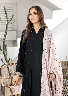 Black pure Boski silk kurta handworked with nude pink resham and mirrorwork details on the neckline, sleeves, front and back of the shirt (Includes shirt only) Cotton Silk Traditional Wear With Embroidered Sleeves, Traditional Cotton Silk Wear With Embroidered Long Sleeves, Traditional Wear With Embroidered Long Sleeves In Cotton Silk, Chanderi Kurta With Embroidered Long Sleeves, Eid Cotton Silk Blouse Piece With Mirror Work, Cotton Silk Kurta With Embroidered Sleeves, Long Sleeve Cotton Silk Kurta With Embroidered Sleeves, Unstitched Cotton Silk Kurta With Embroidered Sleeves, Long Sleeve Chanderi Kurta With Mirror Work