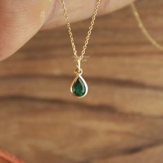 Handcrafted Pear Cut Emerald Pendant Necklace - Minimalist Lab Grown Gemstone Jewelry. Elegant Minimalist Lab Grown Emerald Pendant Necklace - Pear Cut Gemstone Jewelry Gemstone ✦ 𝗟𝗮𝗯 𝗚𝗿𝗼𝘄𝗻 / 𝗖𝗿𝗲𝗮𝘁𝗲𝗱 𝗘𝗺𝗲𝗿𝗮𝗹𝗱 - 𝗠𝗮𝗻 - 𝗠𝗮𝗱𝗲 ✦ Pear Cut -  ✦ Color -Green ✦ Excellent / Very Good Cut - Size (mm) : 3/4 mm (approx) ✦ Setting :  Bezel ✦ Bail -  3 mm Diameter Inside ✦ READY TO SHIP - GIFTS ✦ ( ONLY CHARM - PENDANT - SELECT CHAIN as per order ) Metal  ✦ Made of recycled 𝗦𝗼𝗹𝗶𝗱 𝗚𝗼𝗹𝗱 - Nickel free - 14k (585) ✦ Color - Yellow Gold - (as per order)  ✦ Weight-  0.400 Grams (Gold weight will vary as per order / Metal purity) ✦ Condition ➠ Brand New, Never been Used ✦ Send a message for Ring in Platinum Pt950 / ✦ Ring Available in Platinum Pt950 ✦ Stamp/Hallmark: Yes Con Dainty 14k Gold Emerald Necklace For Anniversary, Dainty Yellow Gold Emerald Necklace For Anniversary, Gold 14k Gold Emerald Necklace For Wedding, Emerald Necklace In Yellow Gold For Weddings, Yellow Gold Emerald Necklace For Wedding, Wedding Emerald Necklace In Yellow Gold, Gold Emerald Birthstone Necklace For Wedding, Minimalist Emerald Necklace For Anniversary, Dainty Emerald Necklace For Formal Occasions In May