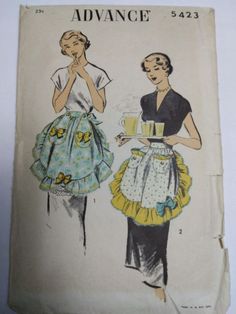 two women wearing aprons and dresses, one is holding a cup