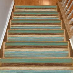 the stairs are painted with different colors and patterns