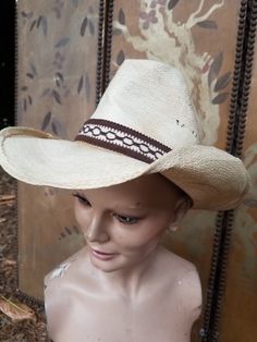 80s stylish light blonde straw cowboy hat with brown fabric trim and hawk feathers made by Cascade hat and Cap Co Inside circumference 22 inches,  height 5.5 inches brim length 15 inches,  brim width 3.5 inches White Straw Hat Bands For Ranch, Cream Straw Hat With Curved Brim For Country Events, Western Cream Straw Hat With Short Brim, Vintage Hats For Western-themed Summer Events, Cream Western Straw Hat With Short Brim, Western Cream Straw Hat For Country Events, Western Style Cream Straw Hat With Short Brim, Cream Western Toquilla Straw Hat, Cream Toquilla Straw Western Hat