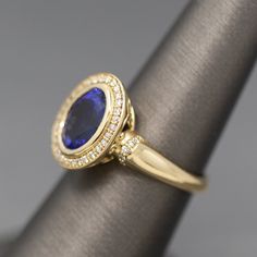 Handcrafted Bold Bezel Set Tanzanite and Diamond Ring in 14k Yellow Go – The Jeweled Crescent Tanzanite And Diamond Ring, Bezel Set Diamond Ring, Oval Sapphire Ring, Bezel Set Engagement Ring, Tanzanite Jewelry, Tanzanite Diamond Ring, Sparkly Things, Rings Rings, Bezel Set Diamond