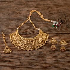 Indian Bridal Traditional One Gram Jewelry Choker Set. Gorgeous 24 K gold plated. Highest quality and craftsmanship, Ready to ship from Edison NJ USA Please contact us any questions Traditional Gold Jhumkas For Marriage, Gold Jhumkas For Marriage And Festive Occasions, Festive Gold Jhumkas For Marriage, Gold Chandbali Jhumkas For Marriage, Gold Heavy Jhumkas For Marriage, Gold Bollywood Jhumkas For Marriage, Bollywood Style Gold Jhumkas For Marriage, Gold Temple Jewelry Style Kundan Necklace For Marriage, Traditional Gold Tikka For Marriage