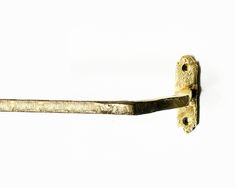 an old brass door handle on a white background