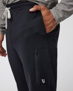 A fresh take on athleisure and a staple in your wardrobe, the Sunday Performance Joggers are premier in fit, function and soft stretch. This jogger style will keep you moving with less bulk around your ankles. | Vuori Sunday Performance Jogger Pants | Black | Medium Vuori makes premium performance apparel inspired by the active Coastal California lifestyle; an integration of fitness, surf, sport, and art. Breaking down the boundaries of traditional activewear, we are a new perspective on perform Best Joggers, Athletic Joggers, Herringbone Jacket, Coastal California, California Lifestyle, Black Joggers, Fashion Joggers, Mens Joggers, Black Xs