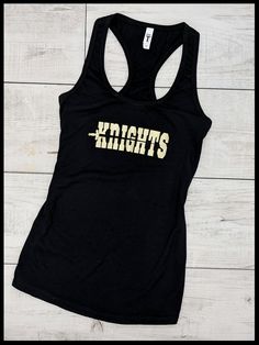 Wear this UCF Knights tank top to the next game or just show your support for the UCF Knights! Our tanks are made using 60% combed ringspun cotton & 40% lightweight polyester jersey. Child sizes available in full back tank upon request. If you're looking for an alternate style, please refer to our other listing below! Shirt care Please turn shirt inside out and wash in cold water using a mild detergent, gentle cycle. Do not use bleach as it can damage the artwork. Hang dry or low heat. Pleas Cotton Screen Print Racerback Tank Top, Team Spirit Sleeveless Tank Top For Sports, Sporty Letter Print Muscle Tank Tee, Fitted Tank Tops For Sports Season, Cotton Scoop Neck Tank Top For Sports, Game Day Cotton Graphic Tank Top, Game Day Cotton Tank Top With Graphic Print, Summer Team Spirit Sleeveless Tank Top, Summer Sleeveless Team Spirit Tank Top