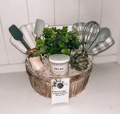 an assortment of kitchen utensils in a basket