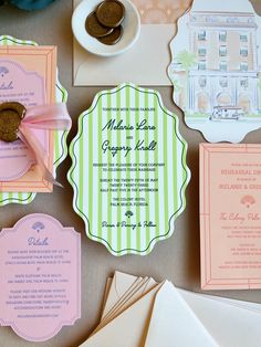 the wedding stationery is laid out on the table