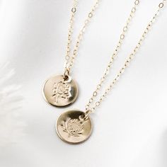 · 1/2" (12.7mm) disc· 14k yellow gold fill, 14k rose gold fill, and sterling silver options· Sturdy, timeless, and built to be worn everydayOur classic 1/2” necklaces are easy to layer, elegant, and ready to be personalized with your most special sentiments, moments, and memories! Created to last a lifetime, these necklaces will remain evergreen even as the years and trends come and go.Personalizing your piece with a message? Reference our fonts and symbols chart for font options and character m Spring Florals, Disc Necklace, Birthstone Charms, Material Design, Spring Floral, Gold Filled, Gold Necklace, Yellow Gold, Rose Gold