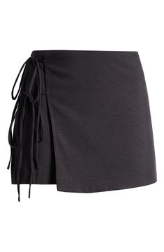 A solid hue amps up the versatility of a wrap miniskirt secured by twin ties at the side. True wrap style with side tie closure 100% polyester Dry clean Imported Side Tie Skirt, Wrap Skirt Outfit, Chiffon Mini Skirt, Cute Black Skirt, Black Miniskirt, Short Wrap Skirt, Vampire Costumes, Mini Wrap Skirt, Tie Skirt