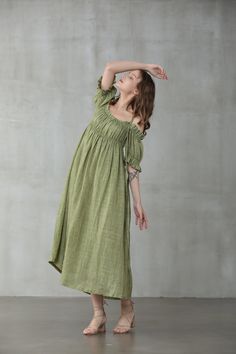 "This linen dress is full of contradictions, ensuring an eye-catching finish. The classic flared structure is contrasted by a slip design, whilst the ruffled details are given a contemporary twist with their asymmetric placement. In a moss green hue, this flared gown is here to turn heads at every event it attends. Off you go. 【Fabric】 95% linen, 5% silk it is Italian linen. exquisite high end texture. we add 5% silk to make it soft and exquisite. lightweight but a little sheer. looks gorgeous. Elegant Green Linen Summer Dress, Elegant Green Summer Linen Dress, Green Linen Bohemian Dress, Bohemian Green Linen Dress, Green Bohemian Linen Dress, Green Linen A-line Midi Dress, Green A-line Linen Midi Dress, Linen Layers, Wedding Linens