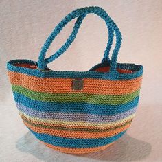 The Perfect Companion for Sunny Days ☀️️ Elevate your style with our handmade crochet tote bag made from natural paper yarn!  Perfect for the beach, picnics, or everyday use, this stylish bag is both lightweight and durable. Its spacious interior allows you to carry your personal belongings and small snacks with ease. A wonderful gift option to make your loved ones happy on special occasions!  Whether it's Mother's Day or Valentine's Day, show your love with this meaningful present. ❤️ Features: Bohemian Bucket Shoulder Bag For Beach, Bohemian Bucket Shoulder Bag For The Beach, Multicolor Hobo Bag With Adjustable Strap For Beach, Handwoven Green Crochet Beach Bag, Bohemian Shoulder Bag For Vacation, Bohemian Bucket Beach Bag, Eco-friendly Crochet Tote Beach Bag, Eco-friendly Crochet Beach Tote Bag, Eco-friendly Handmade Crochet Bag