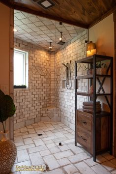 a walk in shower sitting next to a window