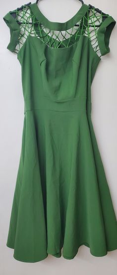 Green 50s style flare dress. Green A-line Midi Dress, Green Lined Midi Dress, Green Fit And Flare Mini Dress For Party, Green Fit And Flare Dress For Evening, Green Fit And Flare Evening Dress, Green A-line Mini Dress For Date Night, Evening Green Fit And Flare Midi Dress, Elegant Green Fit And Flare Mini Dress, 1950s Style Green A-line Dress