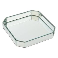 a glass tray with a square shaped design on the front and sides, set against a white background