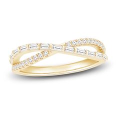 This diamond crossover fashion ring makes an intriguing addition to your ring stack. 10K yellow gold Baguette-cut and round diamonds Split crossover shank 1/3 carat total diamond weight Criss Cross Diamond Band, Baguette Ring Stack, Crossover Diamond Ring, Diamond Fashion Jewelry, Crossover Ring, Jared The Galleria Of Jewelry, Ring Stack, Anniversary Jewelry, Popular Jewelry