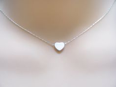 tiny heart Minimalist Hypoallergenic Heart Charm Necklace, Dainty Silver Necklace With Heart Beads, Silver Heart Beads Charm Necklace For Wedding, Hypoallergenic Heart Charm Necklaces For Everyday, Hypoallergenic Heart Charm Necklace For Everyday, Silver Wedding Charm Necklace With Heart Beads, Wedding Silver Charm Necklaces With Heart Beads, Everyday Hypoallergenic Heart Charm Necklace, Simple Silver Necklaces For Mother's Day